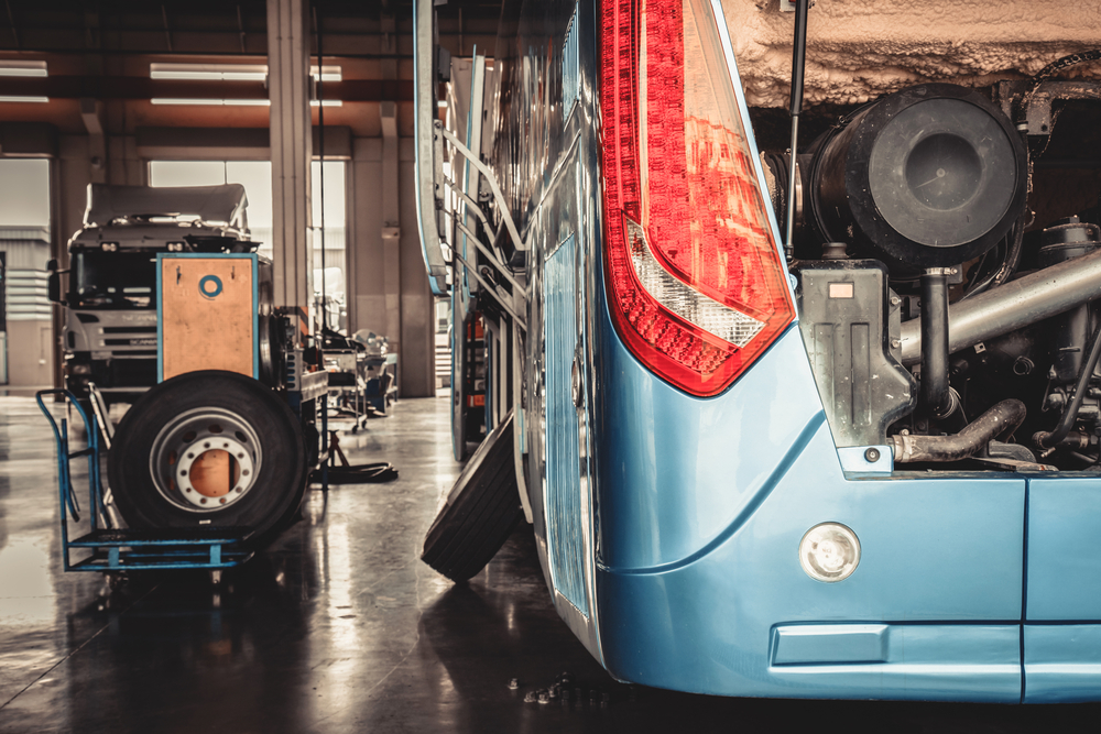 Bus,And,Truck,Waiting,For,Service,In,The,Garage,,Vintage