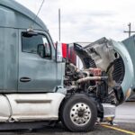 Broken,Big,Rig,Gray,Semi,Truck,With,Open,Hood,Standing
